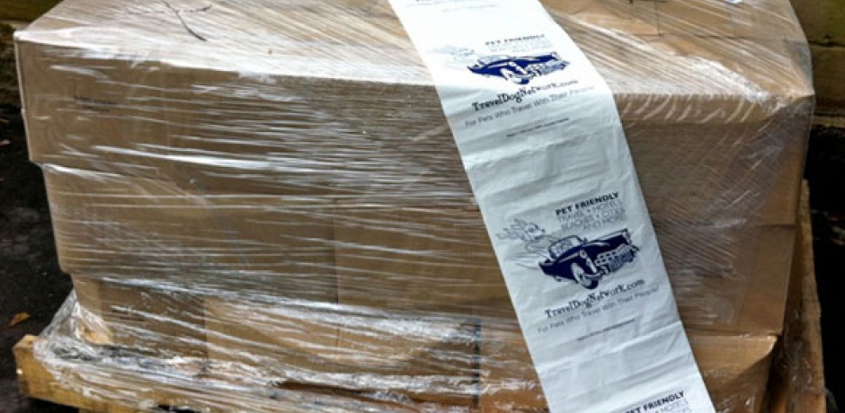 Thousands of Travel Dog custom waste bags delivered on pallet.